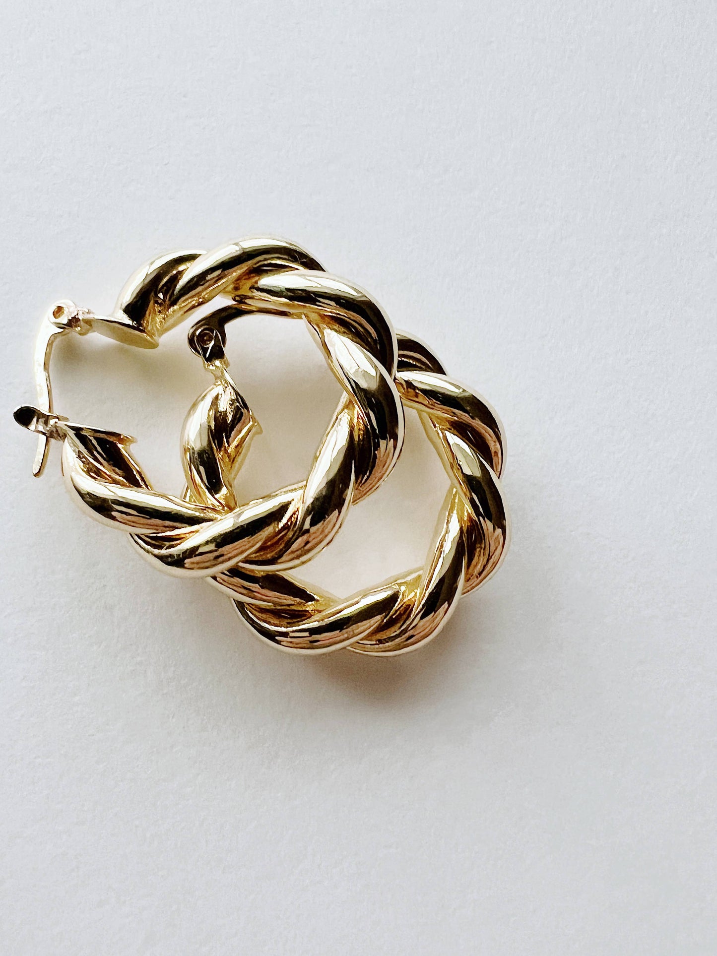 Gold twist hoop earrings